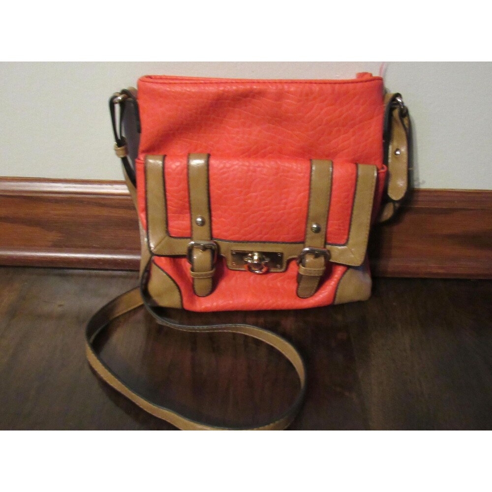 Charming Charlie crossbody bag/ bright orange and light brown/see photos.